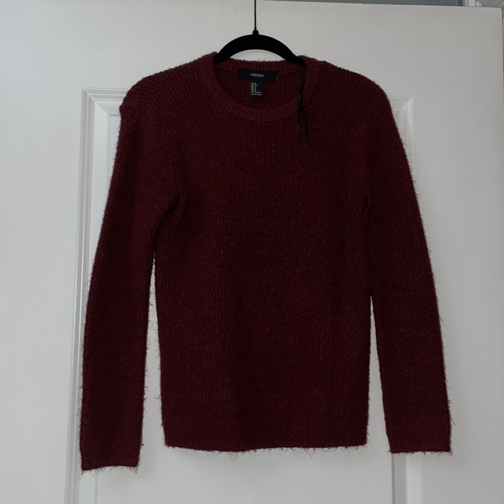 Size S maroon light sweater. good condition